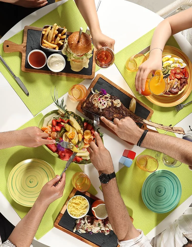 Friends sharing food Hilton Skanes Monastir